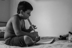 Boy with flute, Image by dalmoarraes from Pixabay